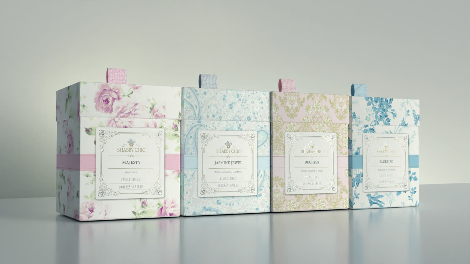 Four Shabby Chic gift boxes, one per scent, each with a ribbon pull tab and a framed label