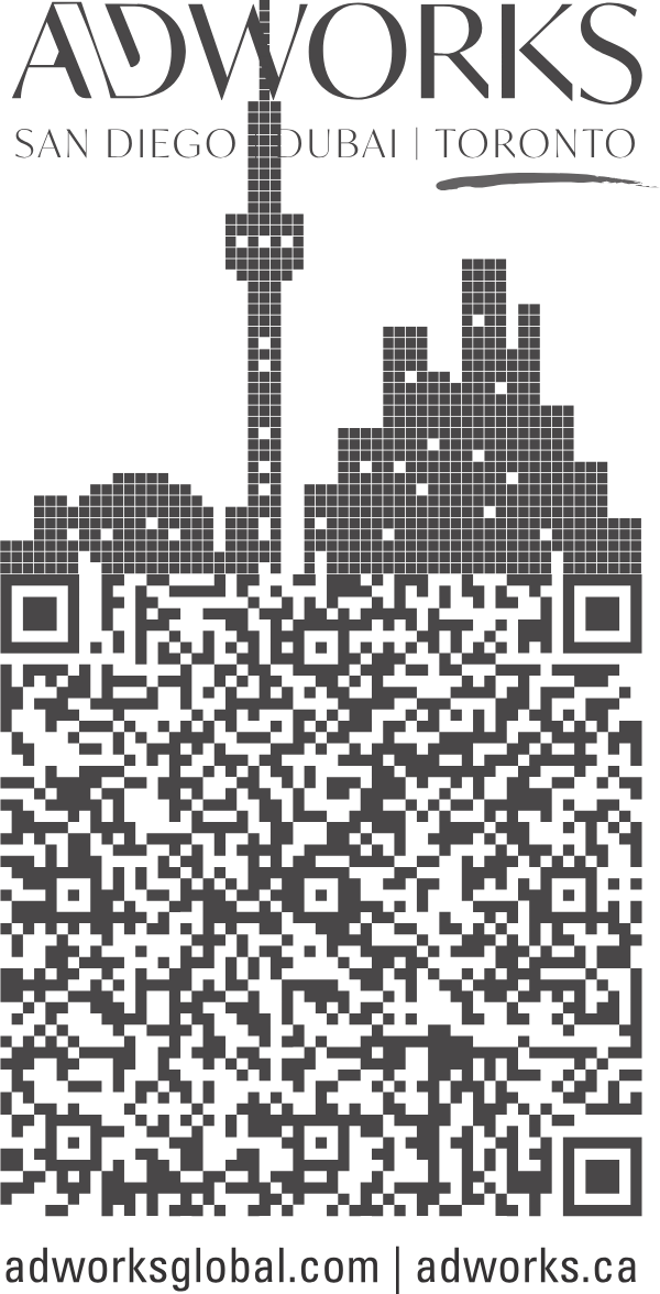 The ADWORKS card back: the CN Tower and the Toronto skyline drawn from the modules of a working QR code, above adworks.ca